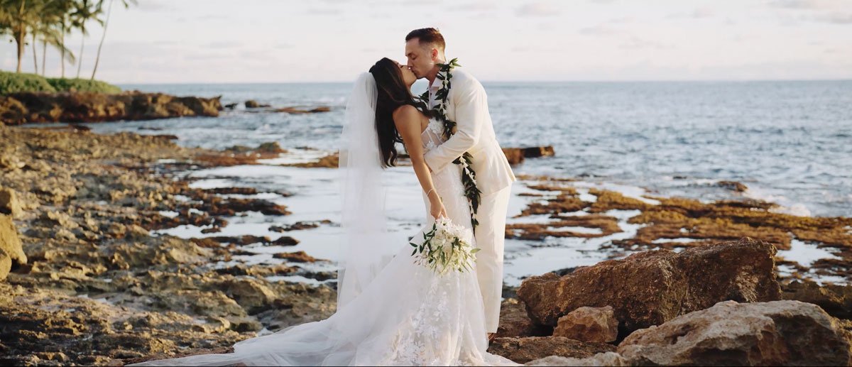 Wedding couple posing at Paradise Cove Ocean Garden