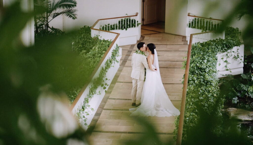 Wedding couple on the bridge at the Four Seasons Resort Oahu