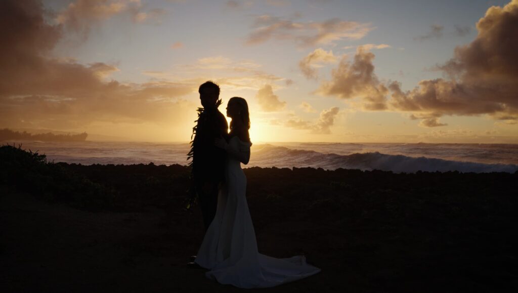 Sunset photo of newlyweds after their Turtle Bay wedding.
